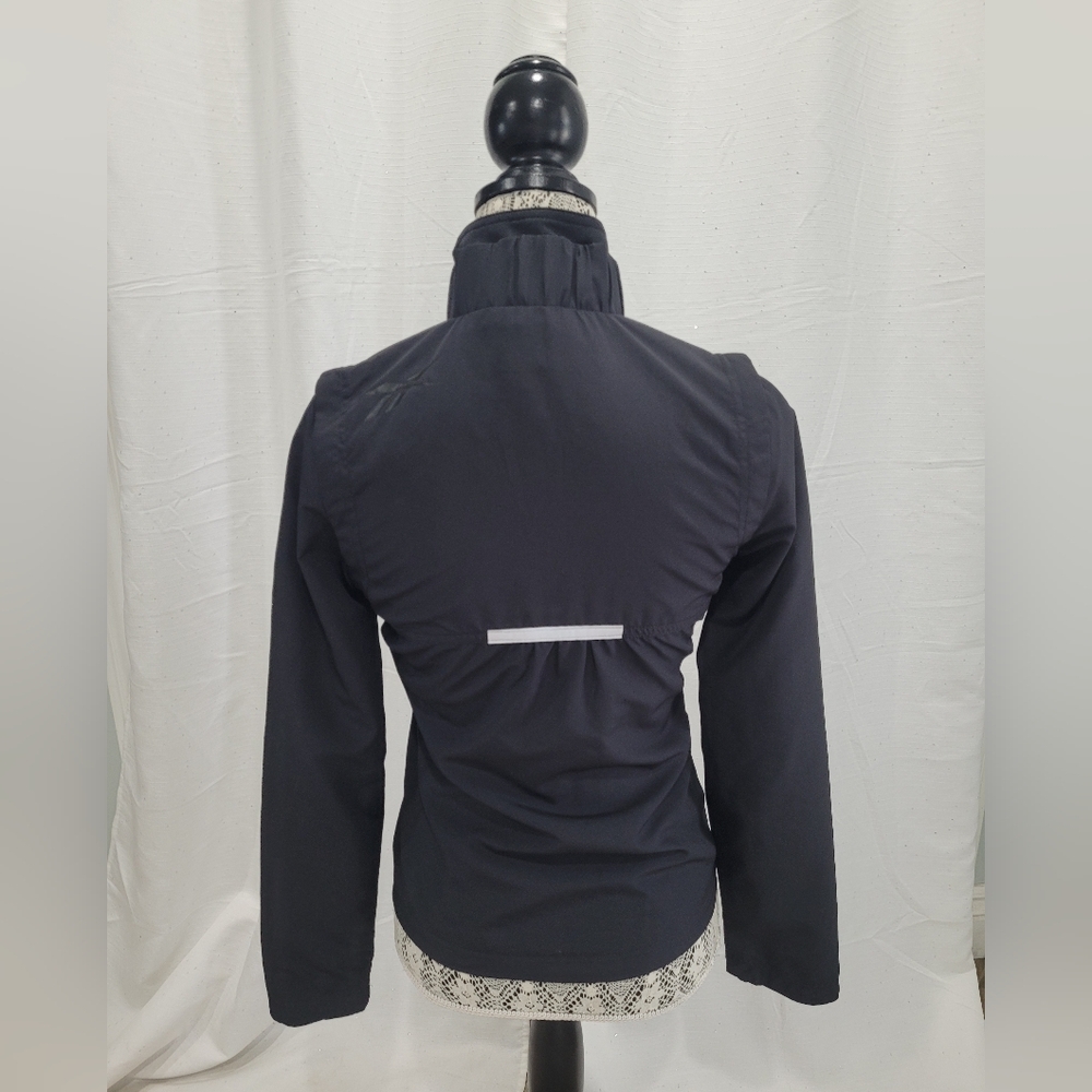 New Reebok Core Running Running Jacket Windbreaker Sz XSmall Black - Picture 6 of 15
